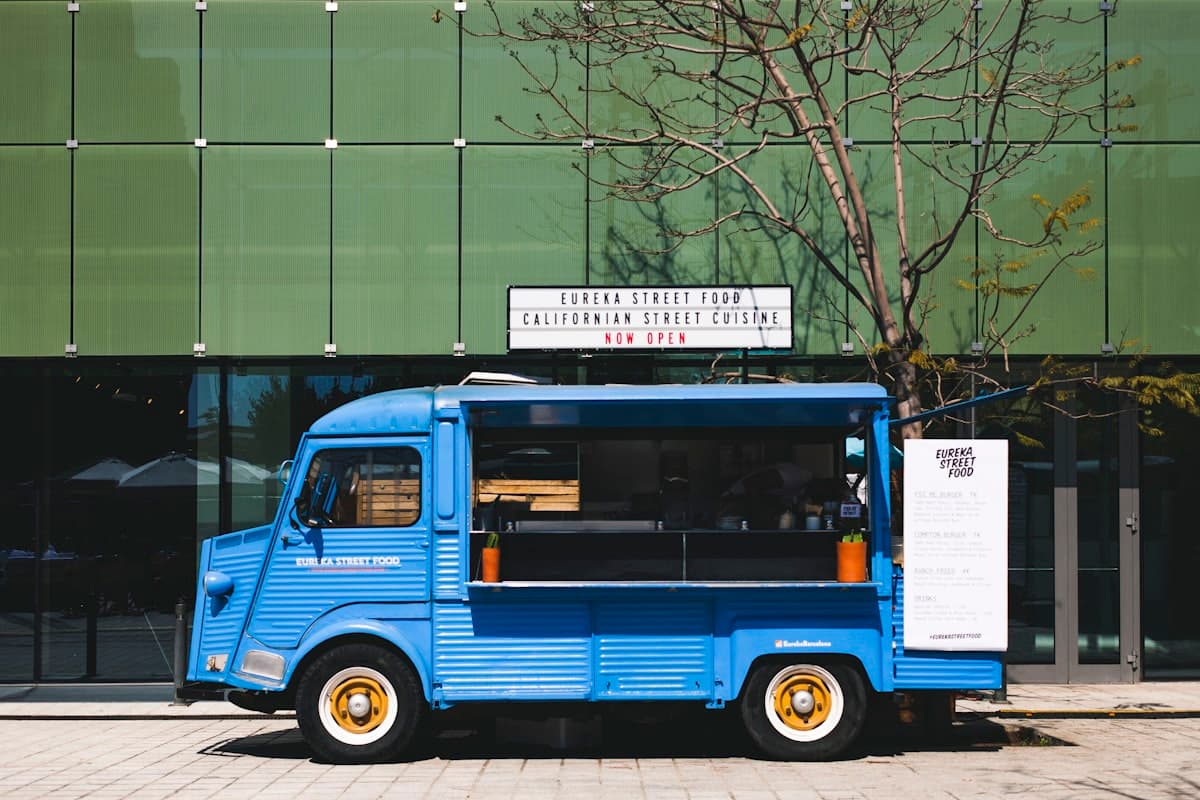 Colorful food truck serving customers outside